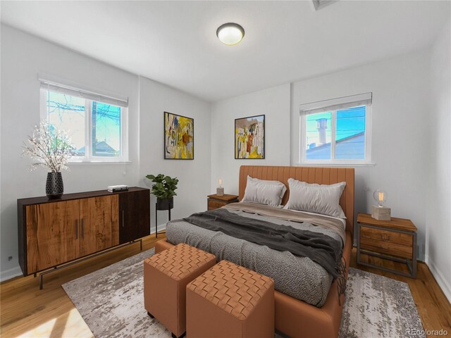 828 Mariposa St, Denver, CO 80204 - bedroom with wood finished floors and baseboards