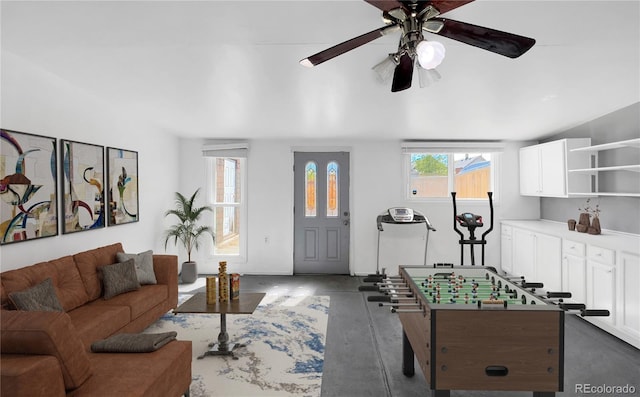 828 Mariposa St, Denver, CO 80204 - living room with finished concrete flooring and ceiling fan