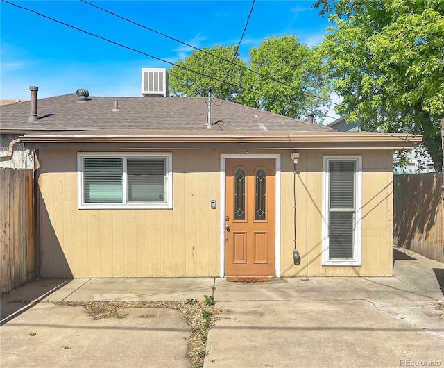 828 Mariposa St, Denver, CO 80204 - rear view of house with a patio area, roof with shingles, and central AC
