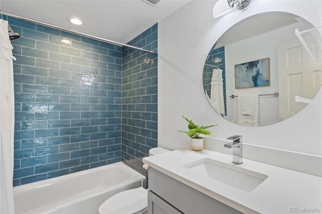 full bathroom featuring vanity, toilet, and shower / bath combo