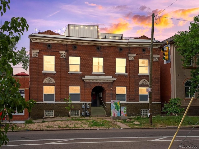 2524 Champa St Unit 1, Denver, CO 80205 - view of front facade featuring brick siding