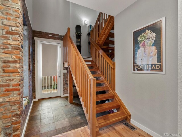 2524 Champa St Unit 1, Denver, CO 80205 - stairs featuring baseboards