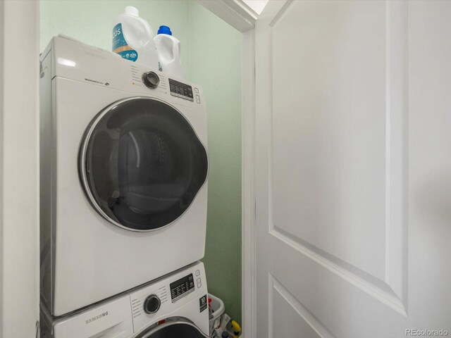 2524 Champa St Unit 1, Denver, CO 80205 - washroom featuring estacked washer and dryer