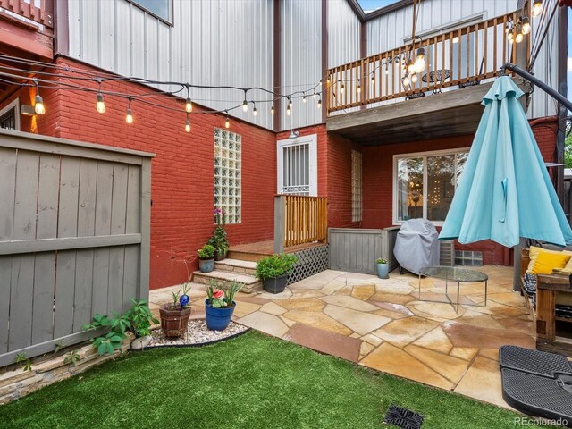 2524 Champa St Unit 1, Denver, CO 80205 - view of patio / terrace featuring grilling area and a deck