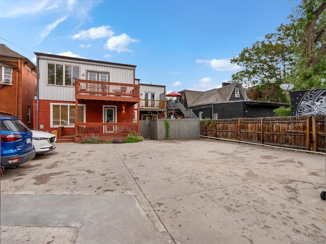 2524 Champa St Unit 1, Denver, CO 80205 - rear view of house featuring a deck