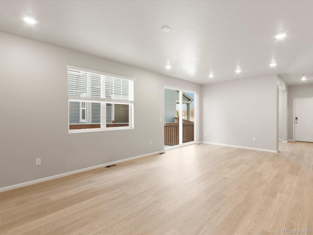 empty room featuring light hardwood / wood-style flooring