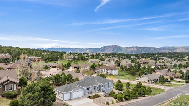 aerial perspective of suburban area with mountains