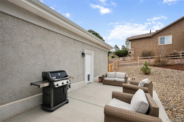 view of patio / terrace with grilling area, fence, and outdoor lounge area