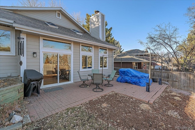 view of patio with a grill