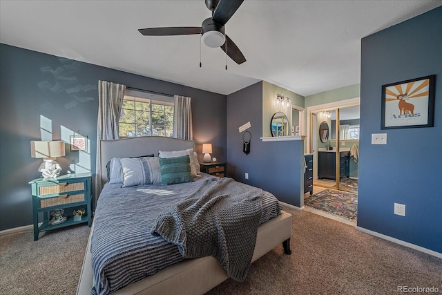 carpeted bedroom featuring ceiling fan and a closet