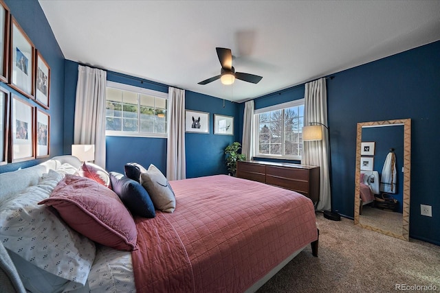 bedroom featuring ceiling fan and carpet flooring