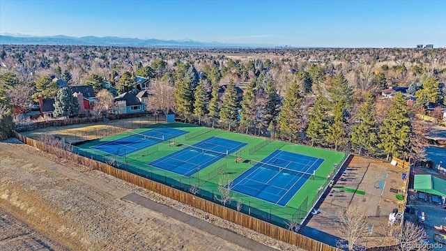 birds eye view of property with a mountain view