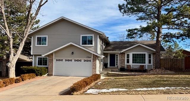 split level home featuring a garage