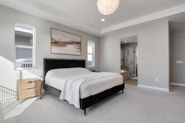 bedroom with ornamental molding, light carpet, baseboards, recessed lighting, and ensuite bath