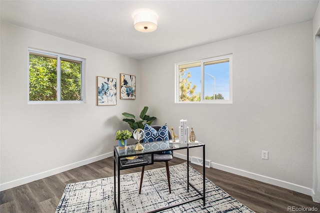 6775 Newland St, Arvada, CO 80003 - office space featuring baseboards and dark wood-style floors