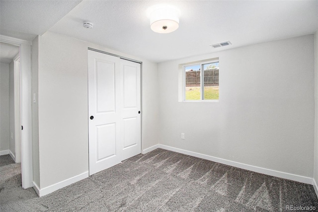 6775 Newland St, Arvada, CO 80003 - unfurnished bedroom featuring carpet flooring, baseboards, and a closet