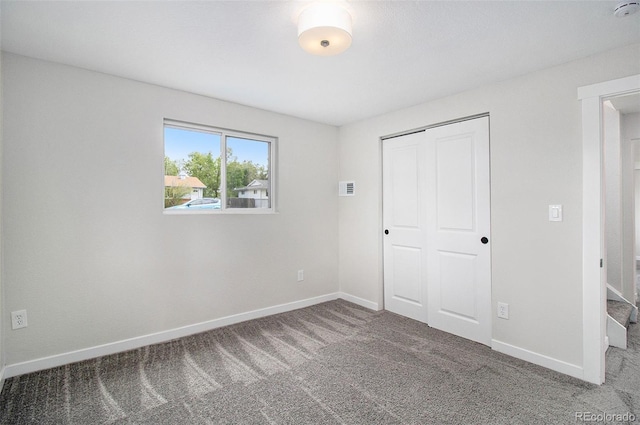 6775 Newland St, Arvada, CO 80003 - unfurnished bedroom featuring carpet floors, baseboards, and a closet