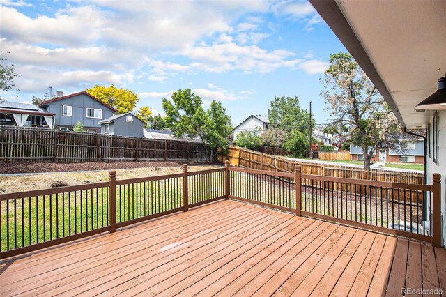 6775 Newland St, Arvada, CO 80003 - wooden terrace featuring a residential view