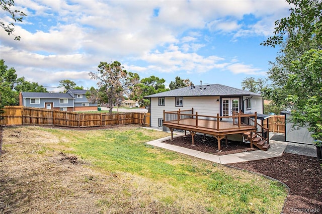 6775 Newland St, Arvada, CO 80003 - back of property with a wooden deck