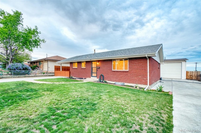 9100 Yucca Way, Thornton, CO 80229 - ranch-style house featuring roof with shingles, fence, brick siding, a garage, and a front lawn