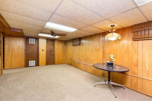 9100 Yucca Way, Thornton, CO 80229 - finished basement with wooden walls, carpet flooring, and visible vents
