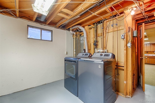 9100 Yucca Way, Thornton, CO 80229 - clothes washing area with washing machine and dryer and laundry area