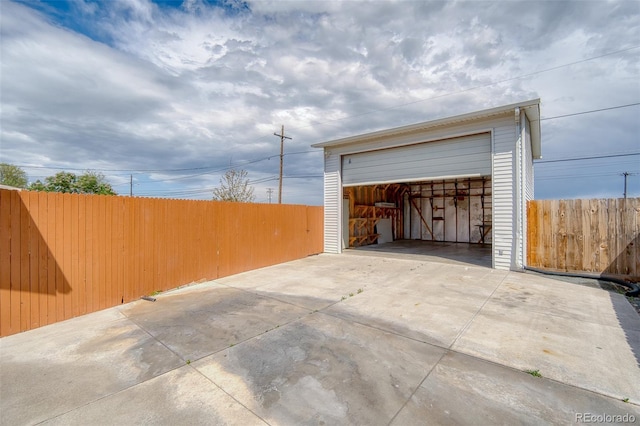 9100 Yucca Way, Thornton, CO 80229 - garage featuring fence