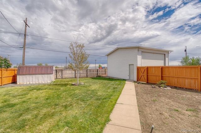 9100 Yucca Way, Thornton, CO 80229 - view of yard featuring a fenced backyard, an outdoor structure, and a storage shed