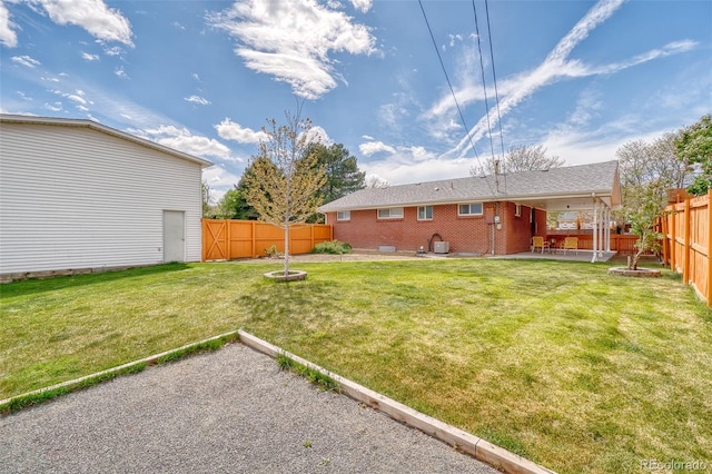 9100 Yucca Way, Thornton, CO 80229 - view of yard featuring a patio area and a fenced backyard