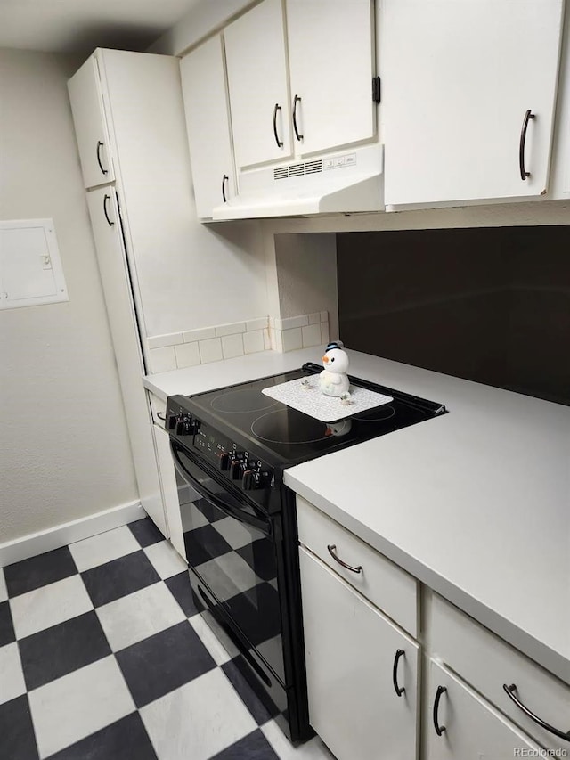 kitchen with white cabinetry and black electric range oven