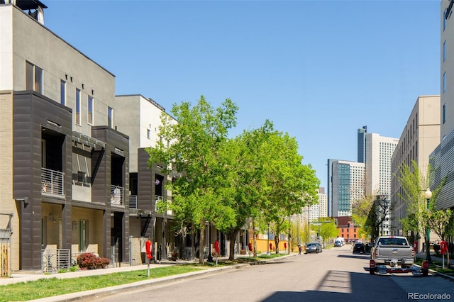 1323 Elati St Unit 3, Denver, CO 80204 - view of asphalt street featuring curbs and sidewalks