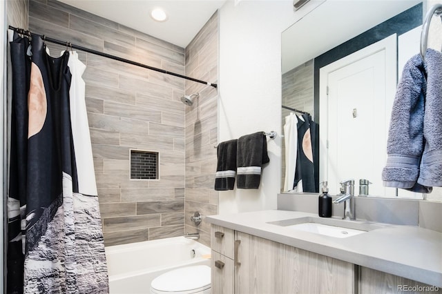 1323 Elati St Unit 3, Denver, CO 80204 - full bath featuring shower / bath combination with curtain, vanity, toilet, and recessed lighting