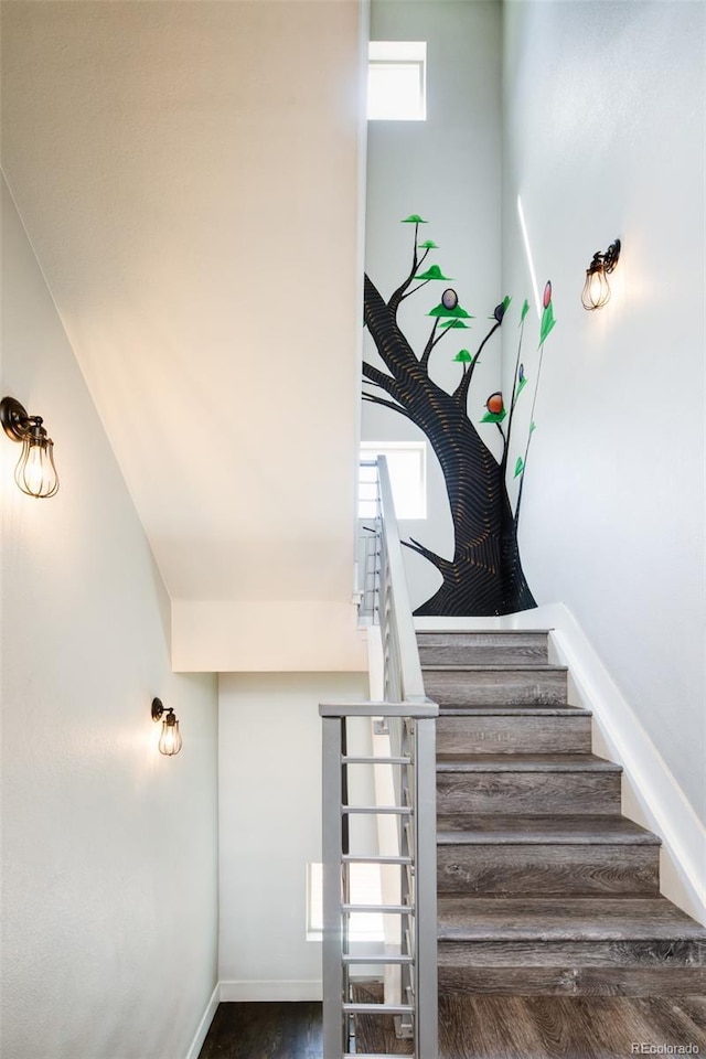 1323 Elati St Unit 3, Denver, CO 80204 - staircase featuring wood finished floors and baseboards