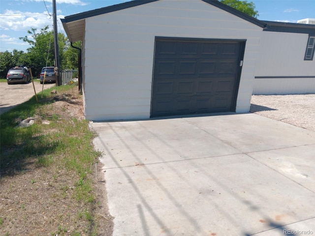 102 Jackson Dr, Firestone, CO 80520 - garage with concrete driveway