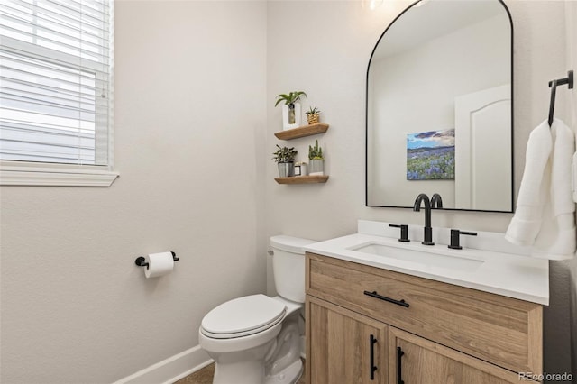 3319 Starry Night Loop, Castle Rock, CO 80109 - bathroom featuring vanity, toilet, plenty of natural light, and baseboards