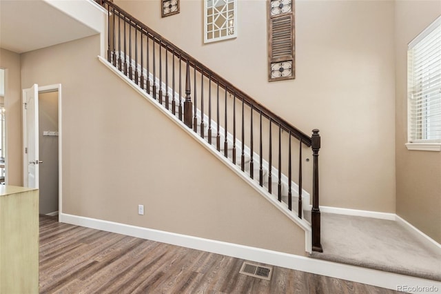 3319 Starry Night Loop, Castle Rock, CO 80109 - stairs featuring wood finished floors and baseboards