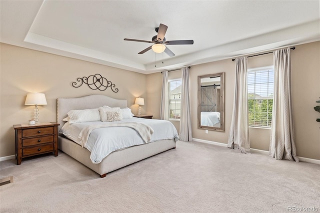3319 Starry Night Loop, Castle Rock, CO 80109 - bedroom featuring multiple windows, baseboards, and light carpet