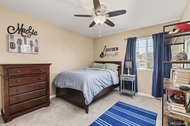 3319 Starry Night Loop, Castle Rock, CO 80109 - bedroom with light carpet, baseboards, and ceiling fan