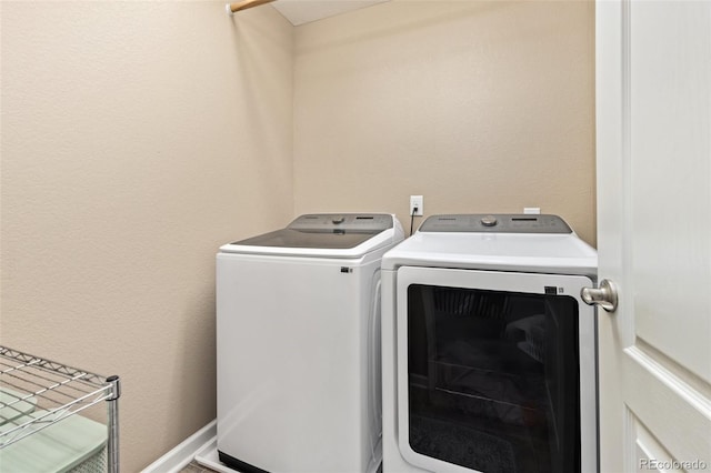 3319 Starry Night Loop, Castle Rock, CO 80109 - laundry area featuring washing machine and clothes dryer