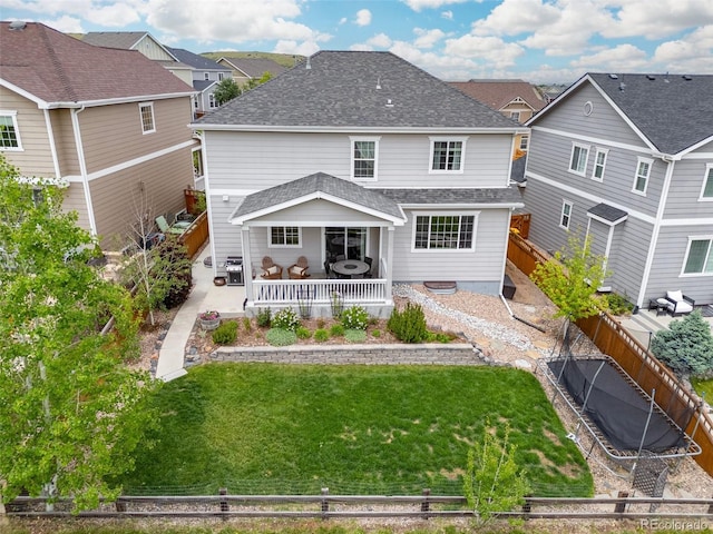 3319 Starry Night Loop, Castle Rock, CO 80109 - back of property featuring roof with shingles, a residential view, and a patio area