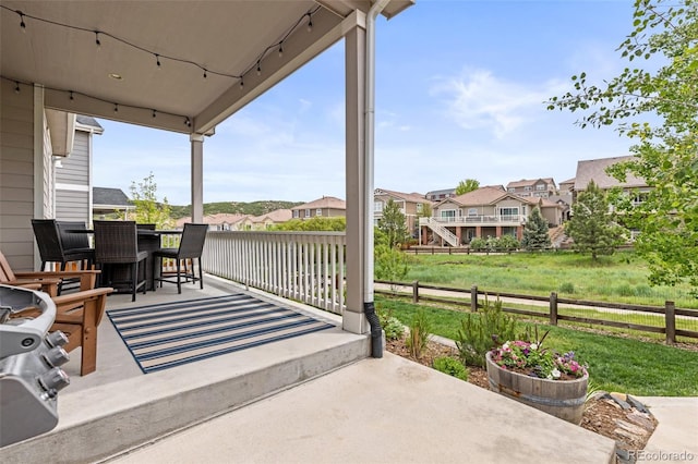 3319 Starry Night Loop, Castle Rock, CO 80109 - view of patio featuring outdoor dining area and a residential view