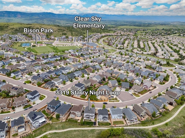 3319 Starry Night Loop, Castle Rock, CO 80109 - aerial view of property's location with nearby suburban area and mountains