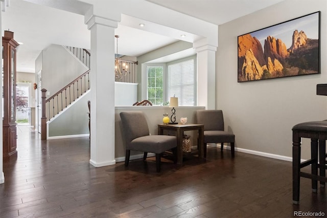 3540 Brushwood Dr, Castle Rock, CO 80109 - sitting room featuring decorative columns, wood-type flooring, plenty of natural light, a chandelier, and recessed lighting