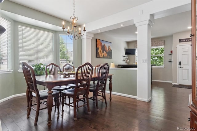 3540 Brushwood Dr, Castle Rock, CO 80109 - dining area featuring dark wood finished floors, a chandelier, recessed lighting, and ornate columns