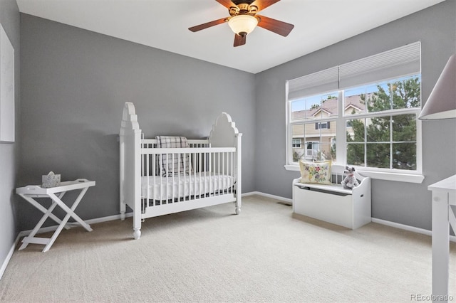 3540 Brushwood Dr, Castle Rock, CO 80109 - bedroom with carpet flooring, a crib, and a ceiling fan