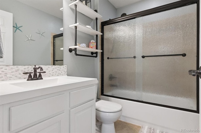 3540 Brushwood Dr, Castle Rock, CO 80109 - bathroom with vanity, decorative backsplash, shower / bath combination with glass door, and tile patterned floors