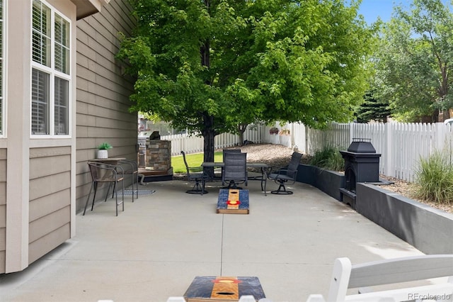 3540 Brushwood Dr, Castle Rock, CO 80109 - fenced backyard featuring outdoor dining space and a patio