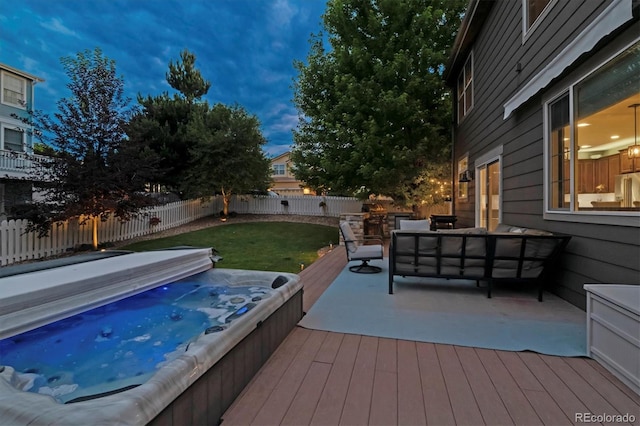 3540 Brushwood Dr, Castle Rock, CO 80109 - wooden terrace with an outdoor hangout area, a covered hot tub, and a fenced backyard