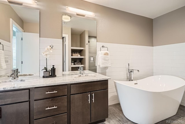 bathroom featuring vanity and a bathtub