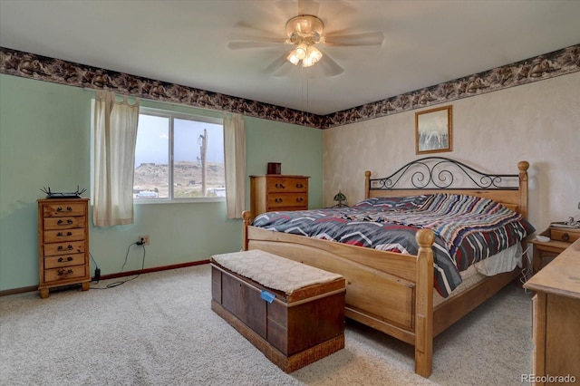 bedroom with ceiling fan and carpet flooring